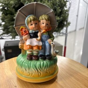 mark. Whimsical Children Figurine with Umbrella - Multicolor